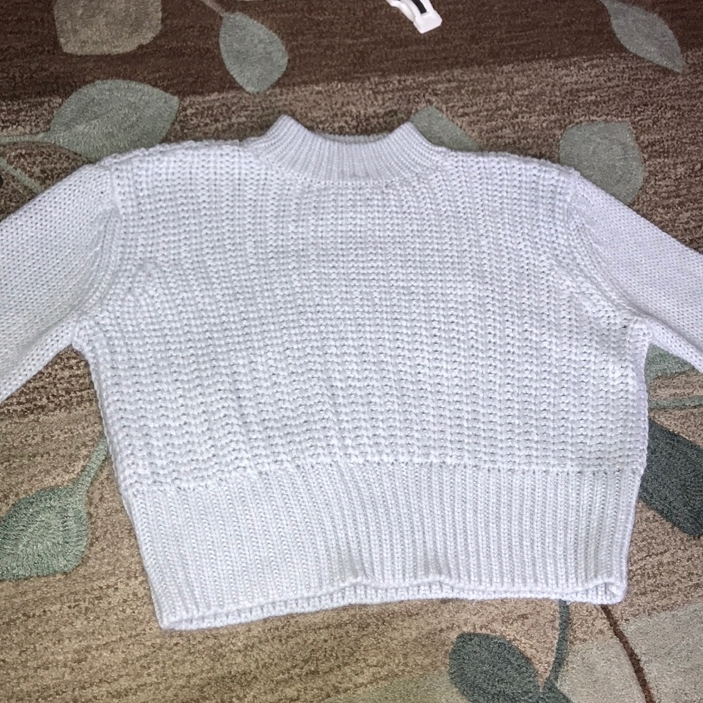A blue Pacsun sweater